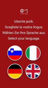 Izbira jezika na vstopni strani T-Art z zastavami Slovenije, Italije, Nemčije in VB.